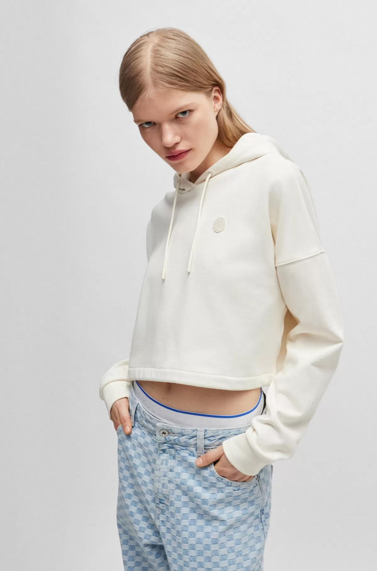 HUGO BOSS Afkortet Hættetrøje I Bomuldsfrotté Med Happy HUGO Logobadge Naturlig Fashion